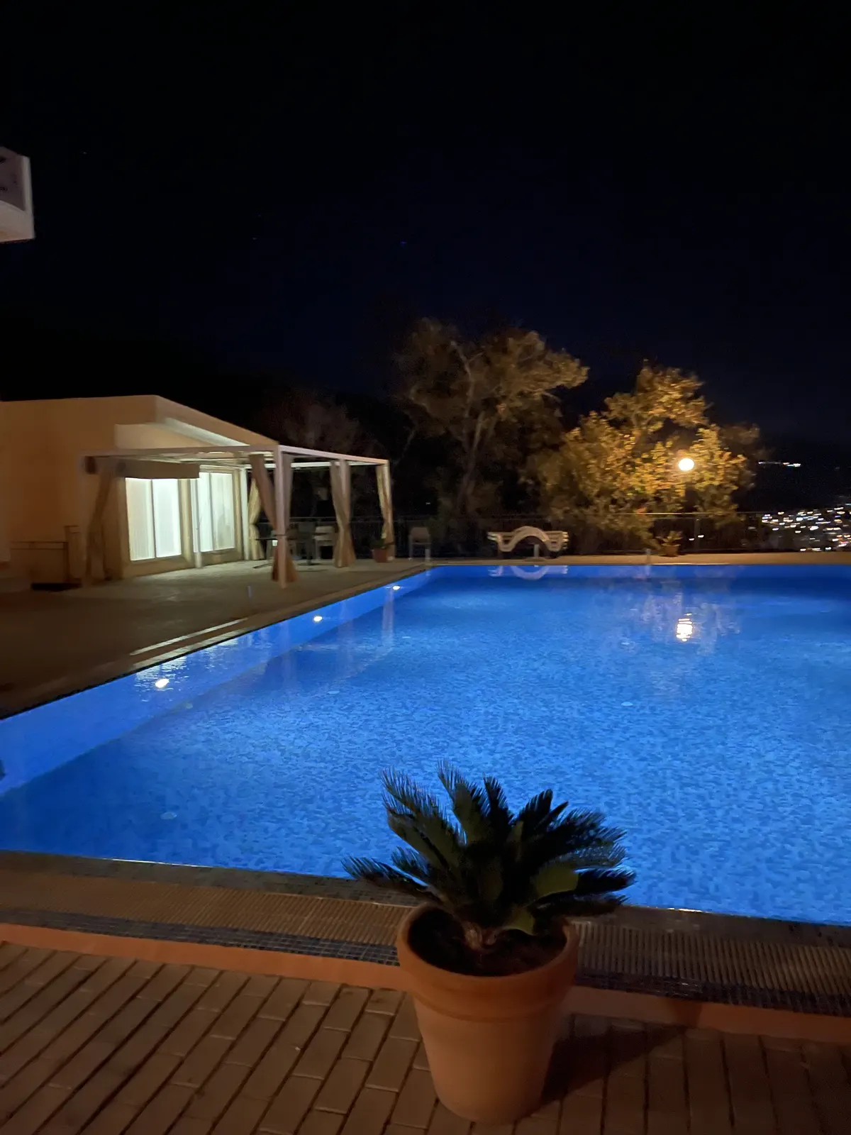 Pool lit up at night